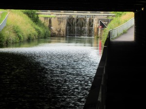 Under the railway bridge we can see that there is a canal