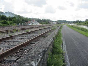 Footpath, railway and canal side by side